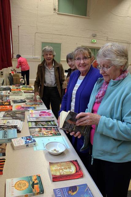 17. Browsing at the book table.jpg